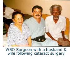 WBO Surgeon with a husband & wife following cataract surgery